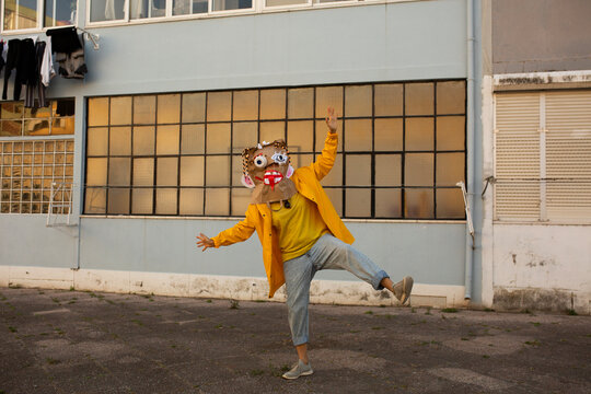woman in diy monster mask  