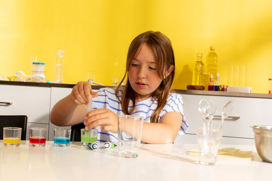 kid working on a science experiment