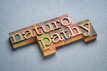 naturopathy, medicine based on the use of natural agents such as air, water, light, heat, and massage to help the body heal itself, words in retro letterpress wood type