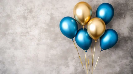 Happy birthday concept with golden and blue balloons on a vintage background