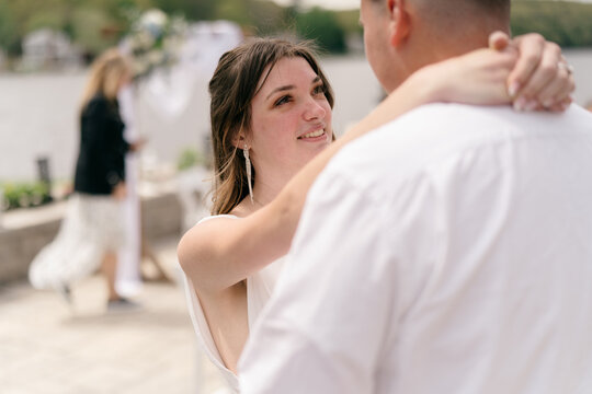 bride and groom first dance during backyard wedding