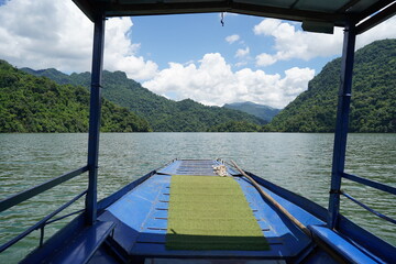 Exploring Ba Be National park in Noth Vietnam by boat. 