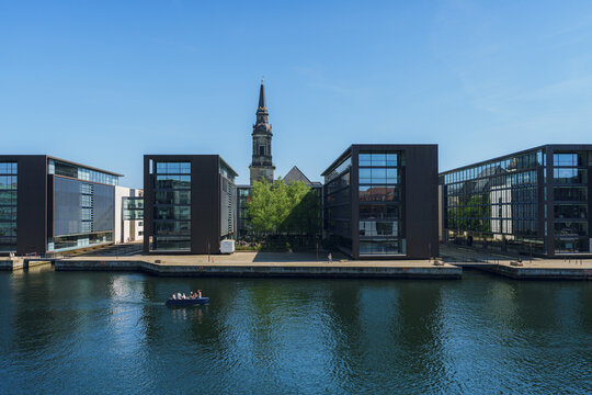 Modern office buildings by the sea on a sunny day on Copenhaguen
