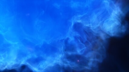 A blue space background with stars and a galaxy