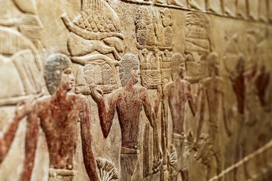 Ancient Egyptian mural with human figures, cultural heritage