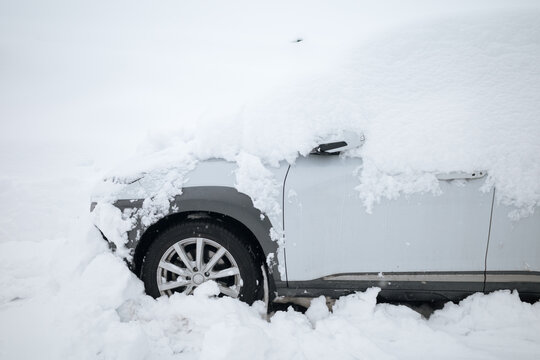 Car Covered In Snow