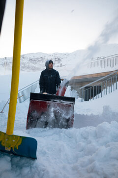 Clearing Snow with Snowblower