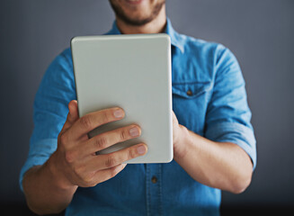 Digital, businessman and hands with tablet in studio for company website update, server maintenance and UX. Professional, web developer and employee with tech for testing new app on gray background