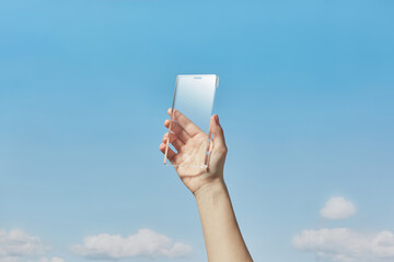 Human raising arm and showing futuristic design of developed device