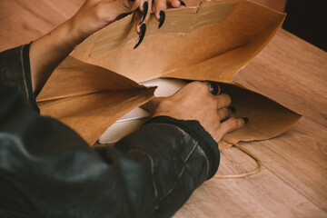 woman reading book in bookstore
