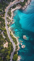 The road winding past the picturesque turquoise water at sunrise