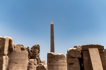 Obelisk among ruins at Karnak Temple, travelling Egypt