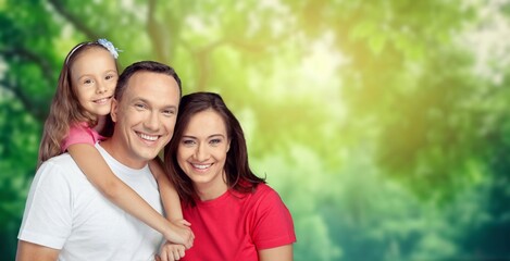 Fototapeta premium Happy young family and children on morning walk