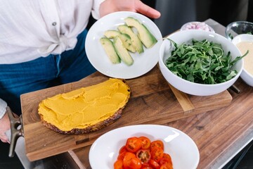 Chef prepping sandwich