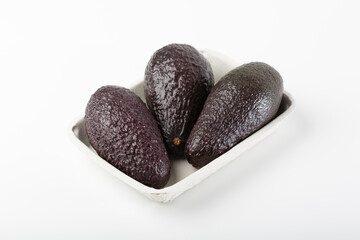 Fresh avocados on white background