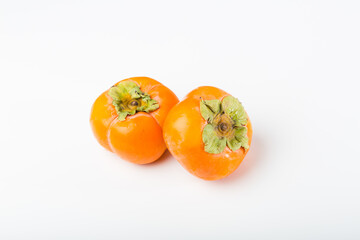 Fresh Kakis on white background
