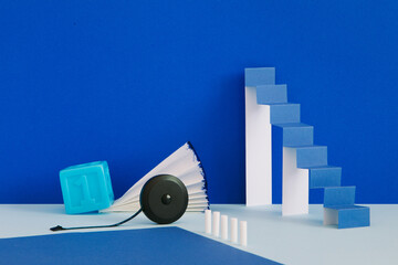 A minimalistic still life with a paper ladder