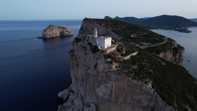 Discover the Breathtaking Lighthouse at Capo Caccia in Sardinia at Sunset