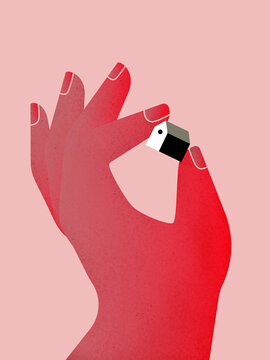Crop red hand holding small house