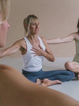 Older Woman Doing Heart Meditation