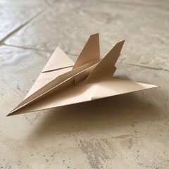 Ready for Takeoff: A meticulously crafted origami airplane poised for flight, embodying the spirit of creativity and the pursuit of dreams. 