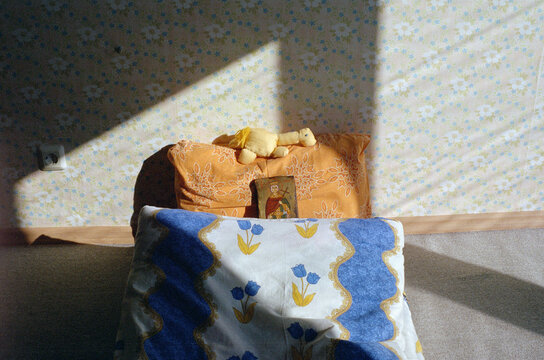 Saint Helena icon and handmade dinosaur toy.