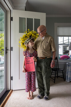 Young Girl with card portrait thanking veteran tribute 