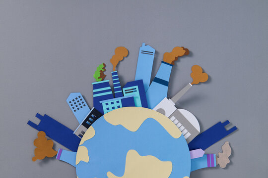 Paper Art Depicting Industrial Pollution Around the Earth