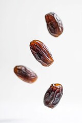 Ajwa Dates fruit levitating on a white background