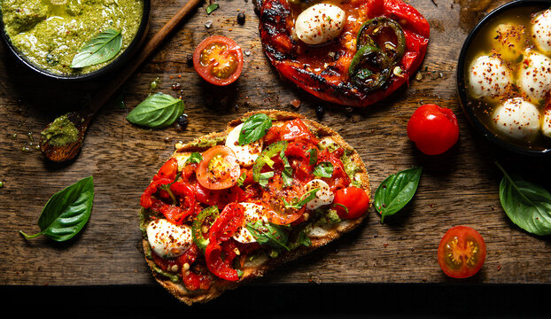 Bruschetta with basil pesto and mozzarella cheese