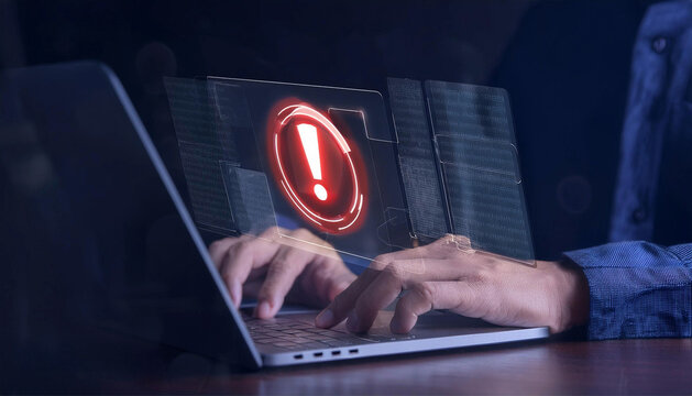 virus alert, hand man using laptop with hologram alert