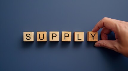 Hand pick the supply wooden block character on navy background. economy, manufacturing and production concept.