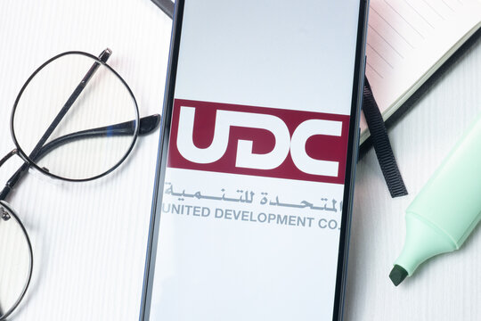 New York, USA - 1 August 2024: United Development UDC Logo on Phone Screen, Company Icon on Display