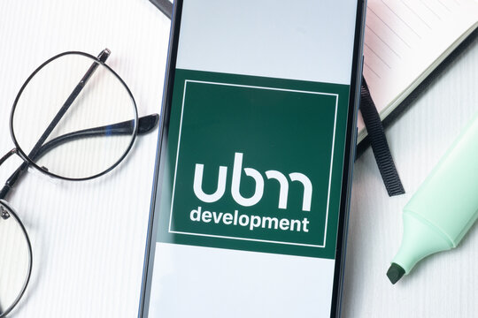 New York, USA - 1 August 2024: UBM Development Logo on Phone Screen, Company Icon on Display