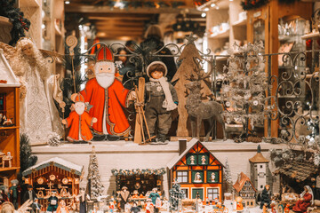 Obraz premium Vintage Christmas Toys and Decor. Saint Nicholas, Reindeer Figure,Christmas Tree in Christmas Toys.Christmas sparkling decor assortment.