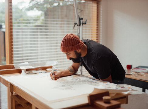 artist drafting a new work