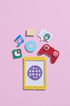 Media technology with mobile phone and icons in paper cut art