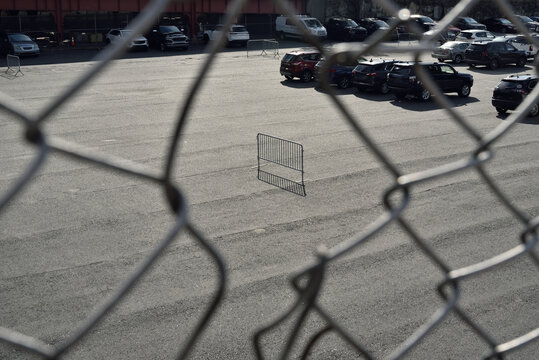 Metal barrier on an empty parking lot
