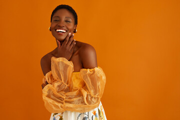 Toothy smile woman touching neck