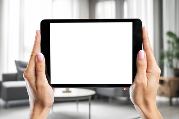 A businessman hands holds digital tablet blank screen
