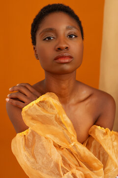 Thoughtful woman in long sleeve top
