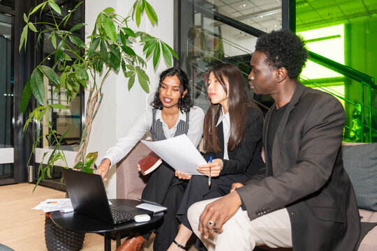 Business Team Reviewing Documents
