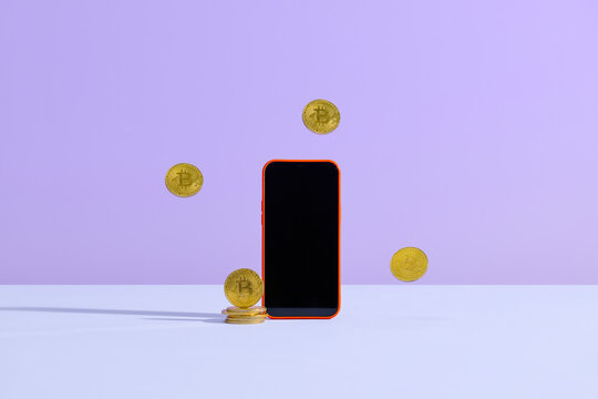 Smartphone with Bitcoin Coins on Purple Background