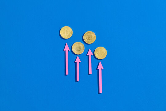 Bitcoin Growth Concept with Upward Arrows on Blue Background - Powered by Adobe