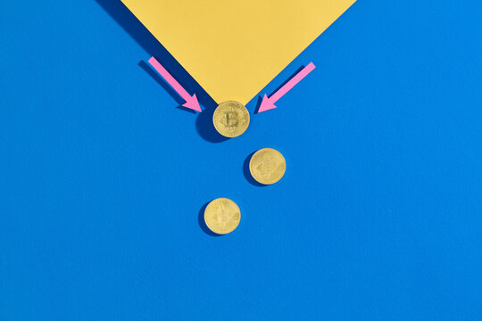 Bitcoin Concept with Arrows and Coins on Blue and Yellow Background