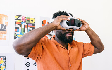 Man using virtual reality headset in modern office space