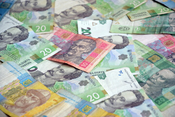 Processed collage of Ukrainian Hryvnia UAH bills banknotes texture. Background for banner