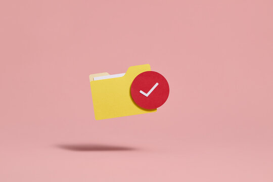 Yellow Folder with Red Checkmark on Pink Background