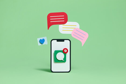 Smartphone With Message Notifications And Chat Icons