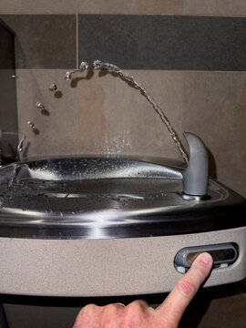 Water fountain in use with spray